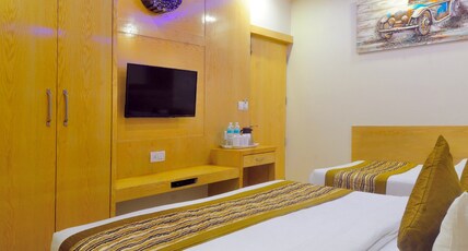 Hotel Prince Palace Deluxe Room Type - Deluxe Triple Room with AC Complimentary Wi-Fi Hotel Prince Palace Deluxe Room Type - Deluxe Triple Room with AC Complimentary Wi-Fi