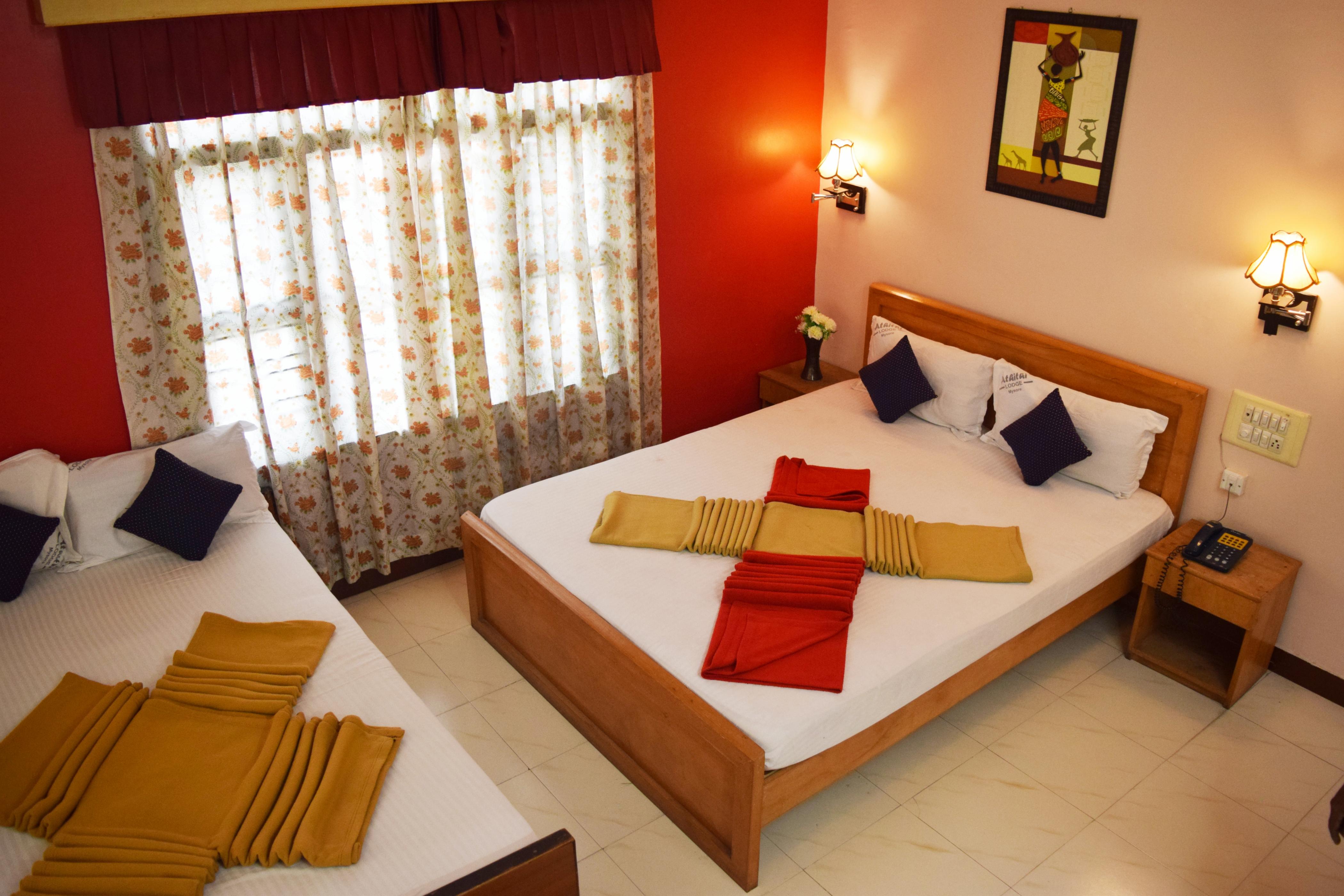 Hotel Athithi Room Type - A/C Deluxe Four bedded