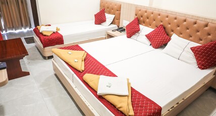 Hotel Supraja Lodge Room Type - Triple Room for 3 Guests | AC | Family Stay Hotel Supraja Lodge Room Type - Triple Room for 3 Guests | AC | Family Stay