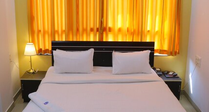 Hotel Embassy International. Room Type - Deluxe Room