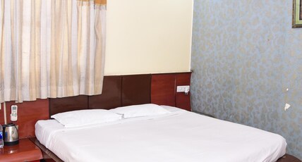 Manoj International Room Type - Deluxe room