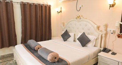 Shree Ganesha Palace Near Kashi Vishwanath Temple Room Type - Deluxe Double Room Shree Ganesha Palace Near Kashi Vishwanath Temple Room Type - Deluxe Double Room