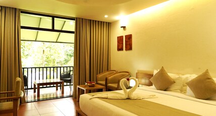 Whispering Waters Resort And Spa Room Type - Deluxe Garden View with Balcony