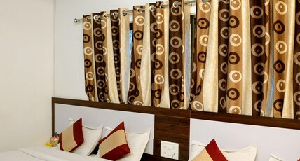 HOTEL ABU GRAND 1 km from nakki lake Room Type - 4 Bed Family Room HOTEL ABU GRAND 1 km from nakki lake Room Type - 4 Bed Family Room