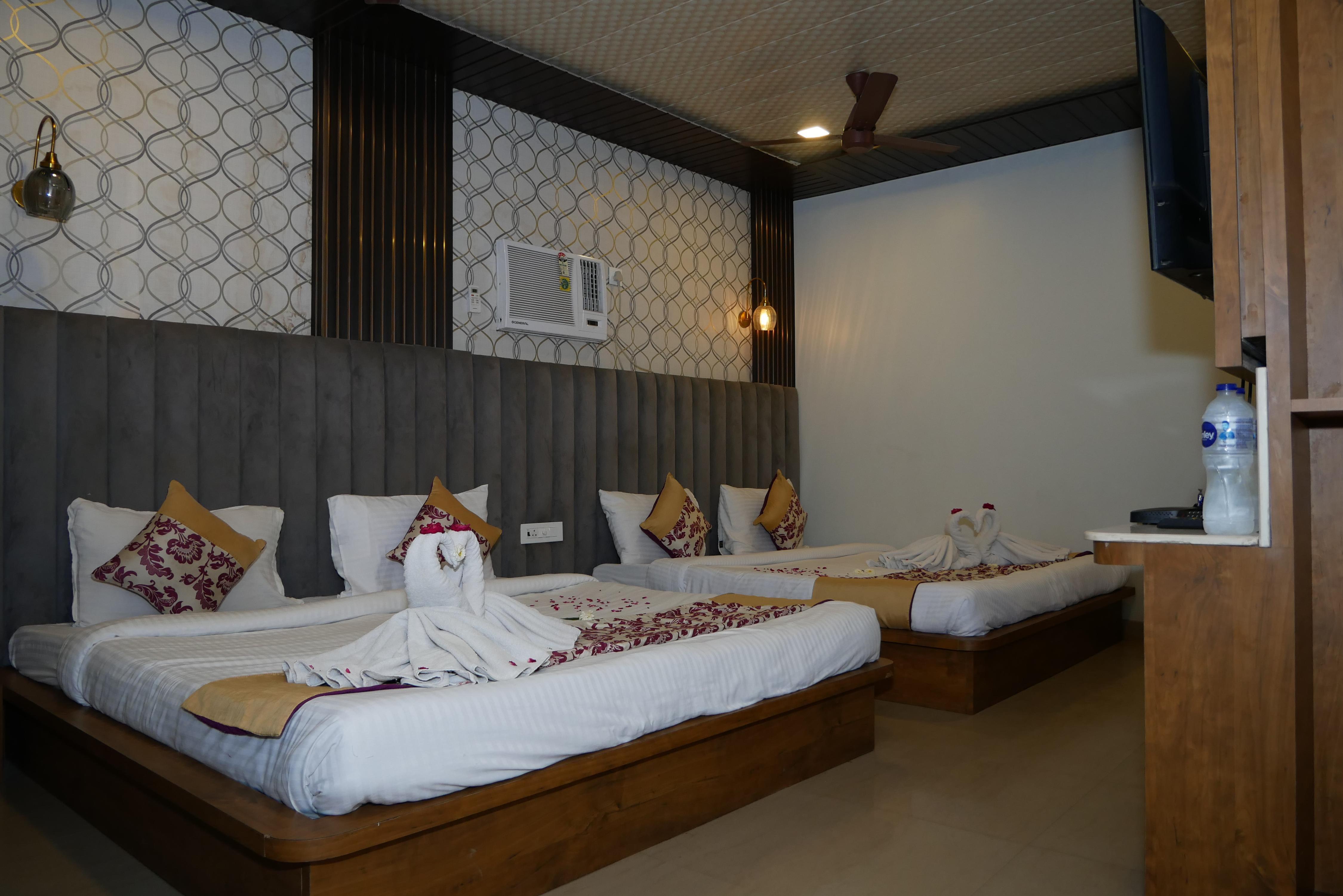 Hotel Deva Inn Room Type - Super Deluxe Four Bedded Room