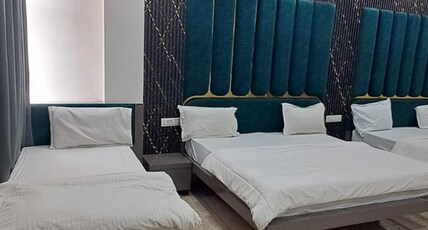 Hotel Jai Palace Room Type - 3 Bed Family Room With 2 Washroom- 8 Person Hotel Jai Palace Room Type - 3 Bed Family Room With 2 Washroom- 8 Person