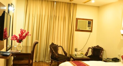 LEGACY SUITS AND RESORT Room Type - Deluxe Room