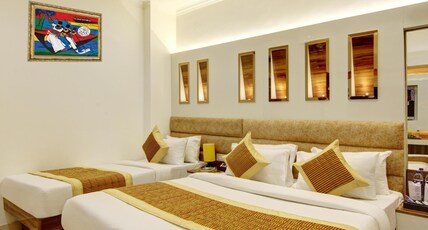 Hotel Star Villa- 1 Minute from NDLS Station Room Type - Triple Elegance Room (1 King+1 Single Bed)
