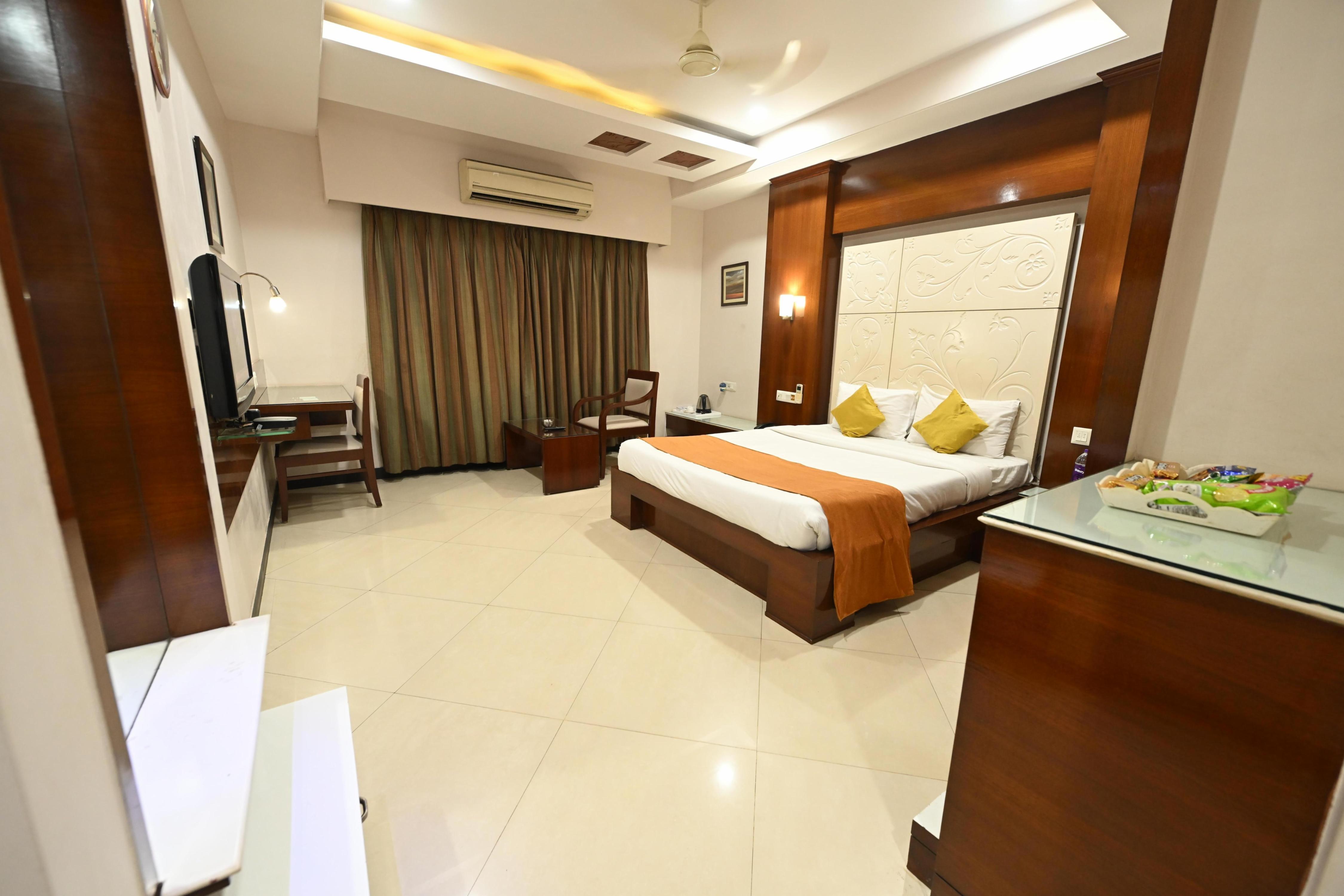 Hotel Amit International - Tap to explore photos