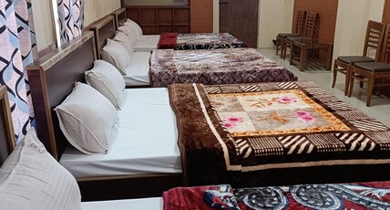 Rainbow Cottages-Budget Friendly Rooms & Restaurant Room Type - FOUR BEDDED DOMINTORY