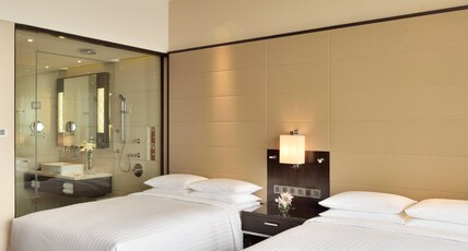 Kochi Marriott Hotel Room Type - Pool View Twin with Seating Area Kochi Marriott Hotel Room Type - Pool View Twin with Seating Area
