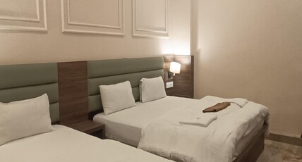 HOTEL NEEL GAGAN  HOTEL TOURIST Room Type - LUXURY TRIPLE BED AC ROOM