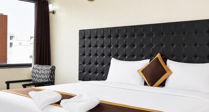Hotel Rajhans International  Room Type - AC Executive Deluxe Room