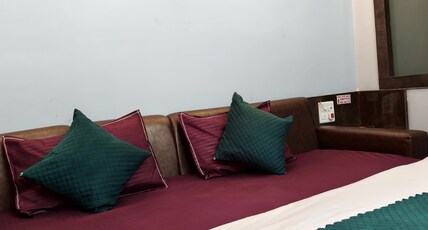 Hotel Shaurya Room Type - AC Deluxe Triple Bedroom With City View