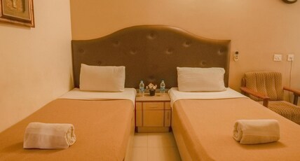 Hotel Udupi International Room Type - Deluxe Room Hotel Udupi International Room Type - Deluxe Room