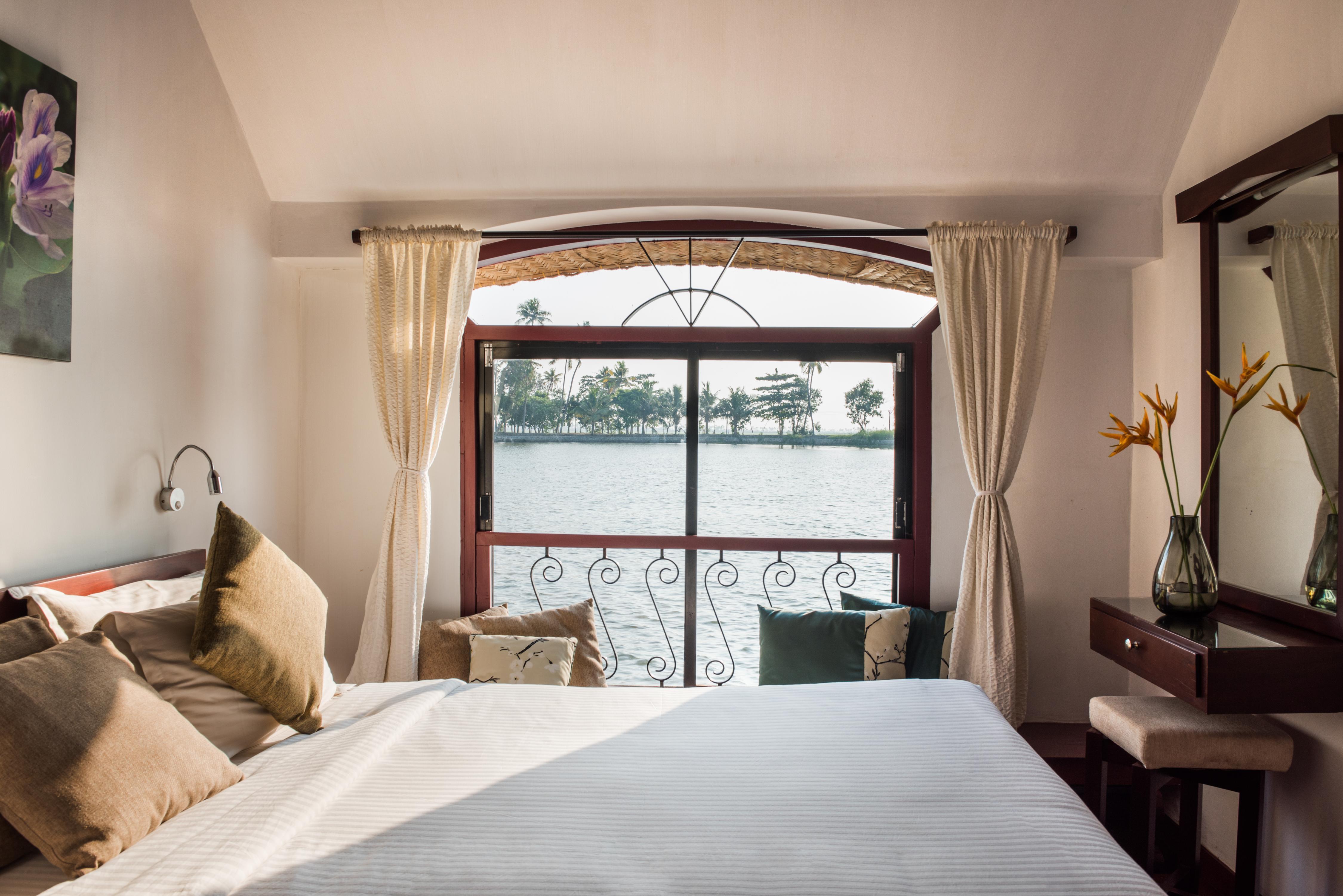 Xandari Riverscapes Houseboat - Tap to explore photos