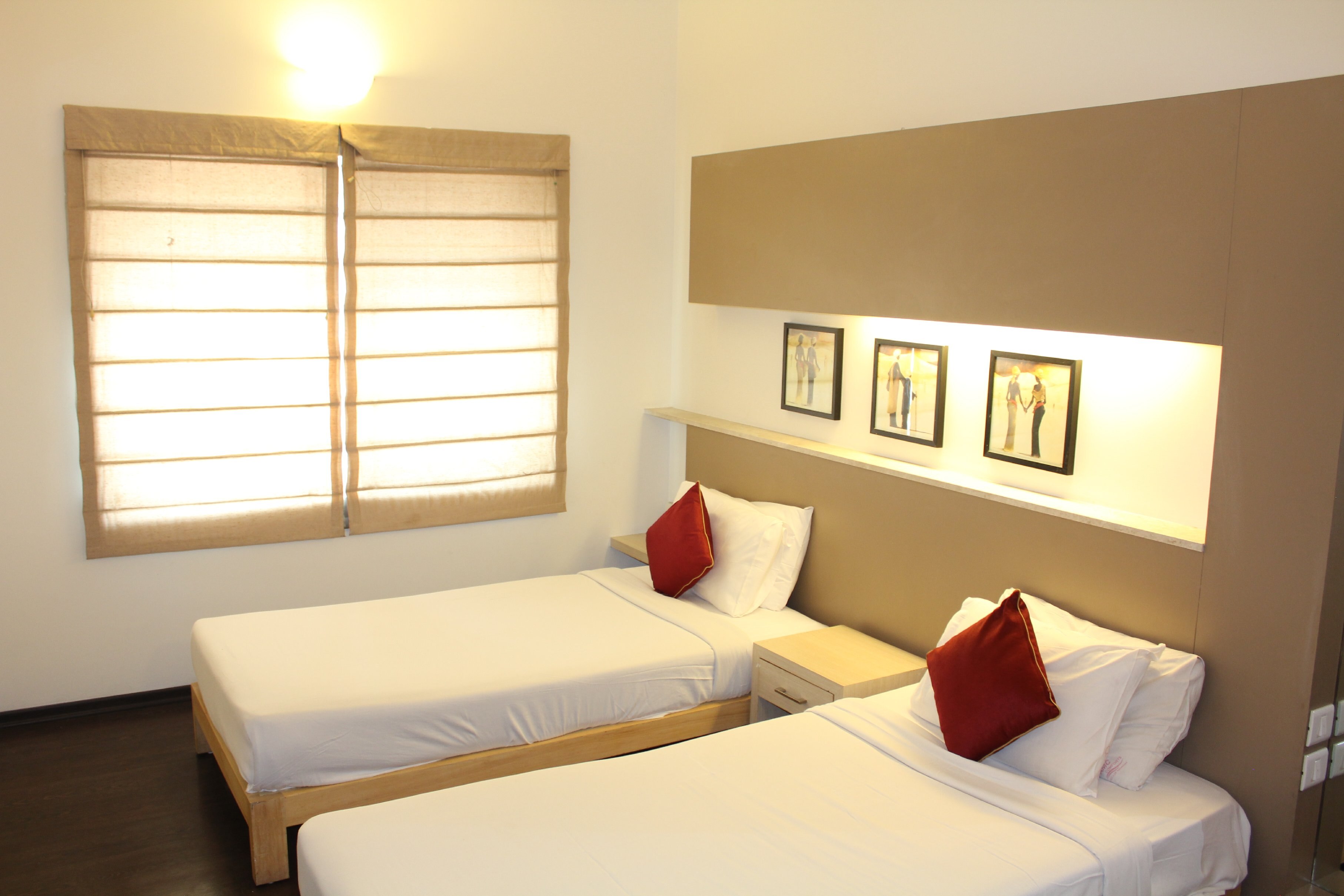 AMC Comforts | Suites & Rooms - Tap to explore photos