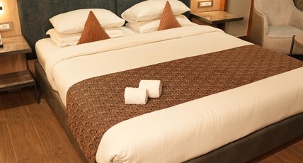MENAKA INN Room Type - Executive AC King Bed Room
