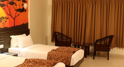 HOTEL REEVANTA Room Type - Deluxe Twin Double Bed