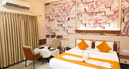 HOTEL POOJA GARDEN AND LODGING Room Type - Deluxe Double Bed AC Room