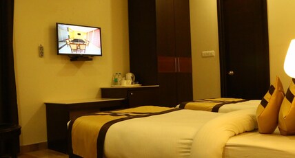 The Golden apple  Room Type - Deluxe Room