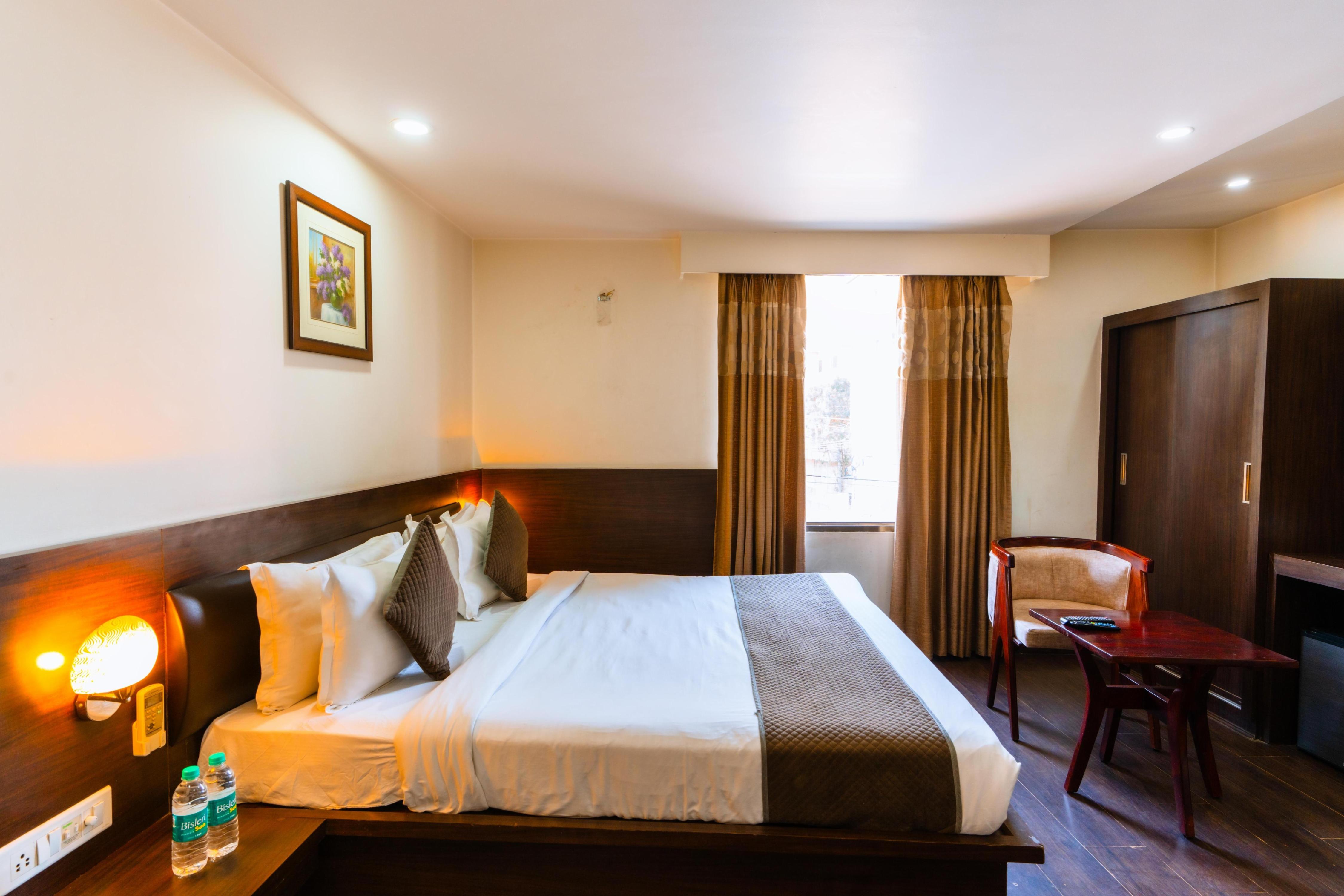 Hotel Krishna by KeyMagics Near Gandhi Nagar Railway Station - Tap to explore photos