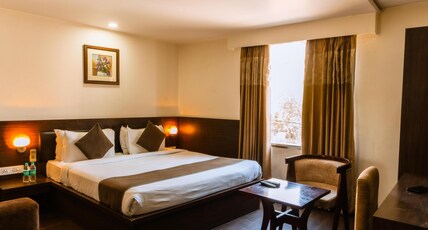 Hotel Krishna by KeyMagics Near Gandhi Nagar Railway Station Room Type - Premium AC Room Hotel Krishna by KeyMagics Near Gandhi Nagar Railway Station Room Type - Premium AC Room