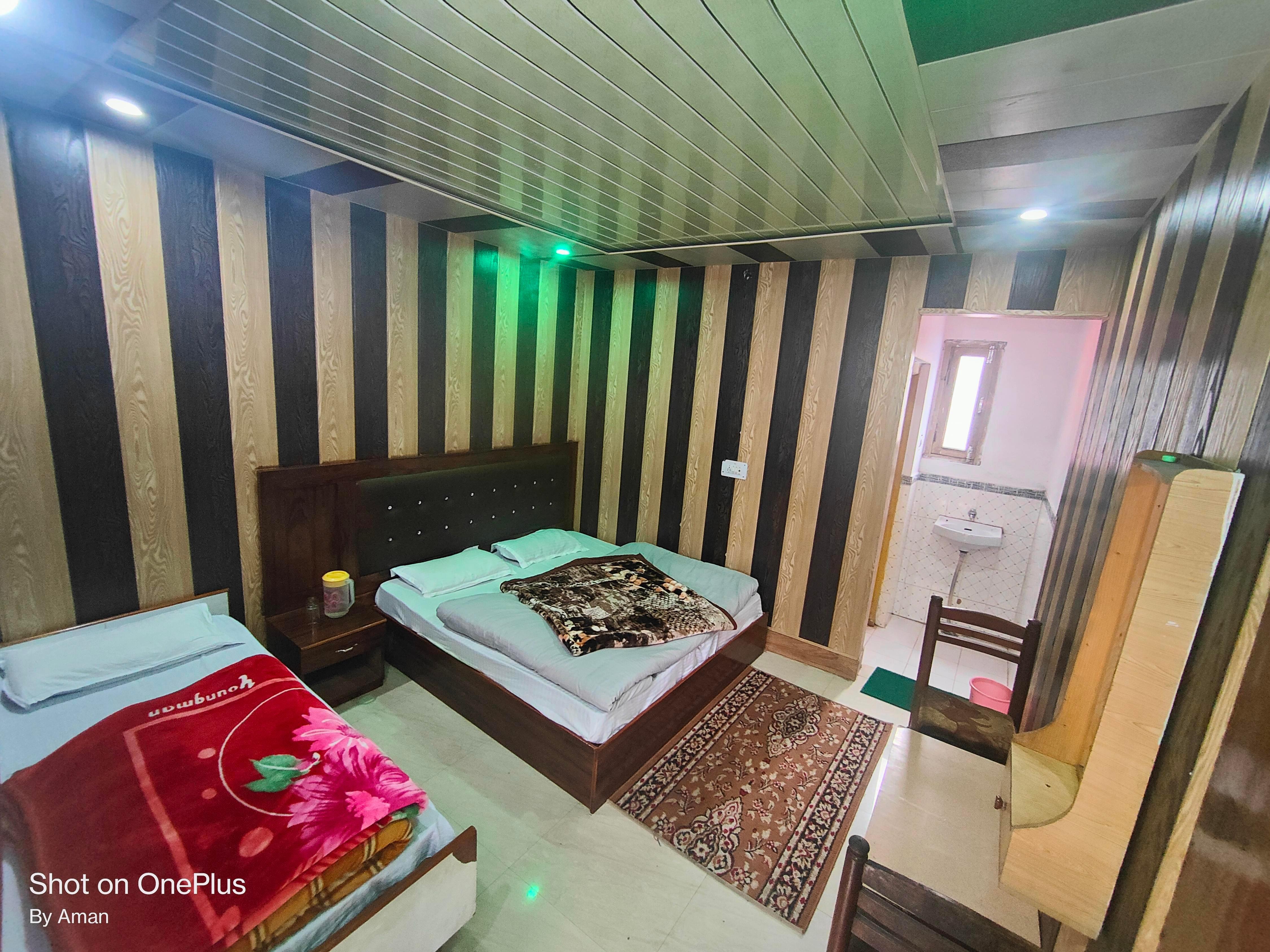 Hotel Kuber - Tap to explore photos