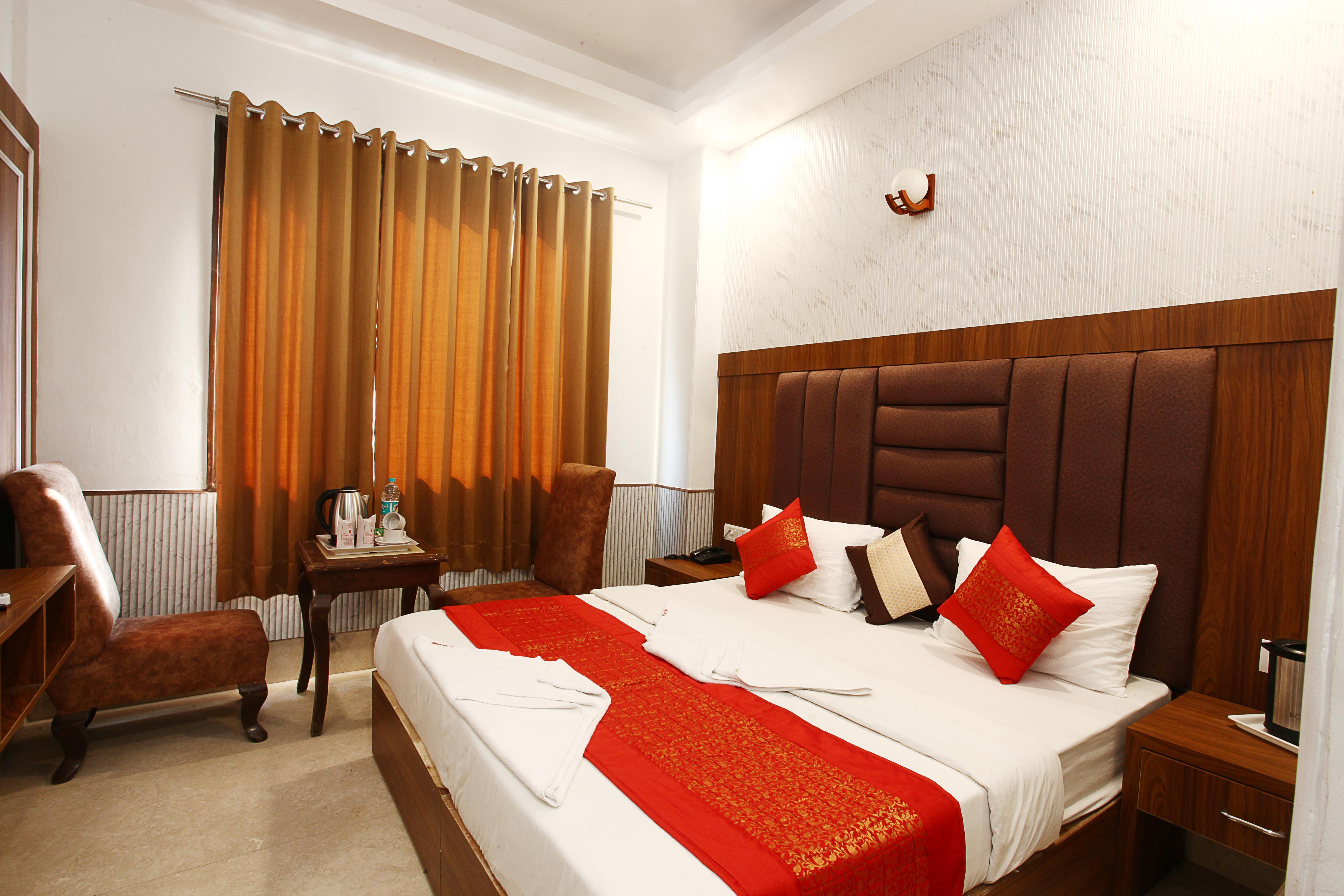 Taksh Inn Room Type - Deluxe AC Room - Free Wi Fi