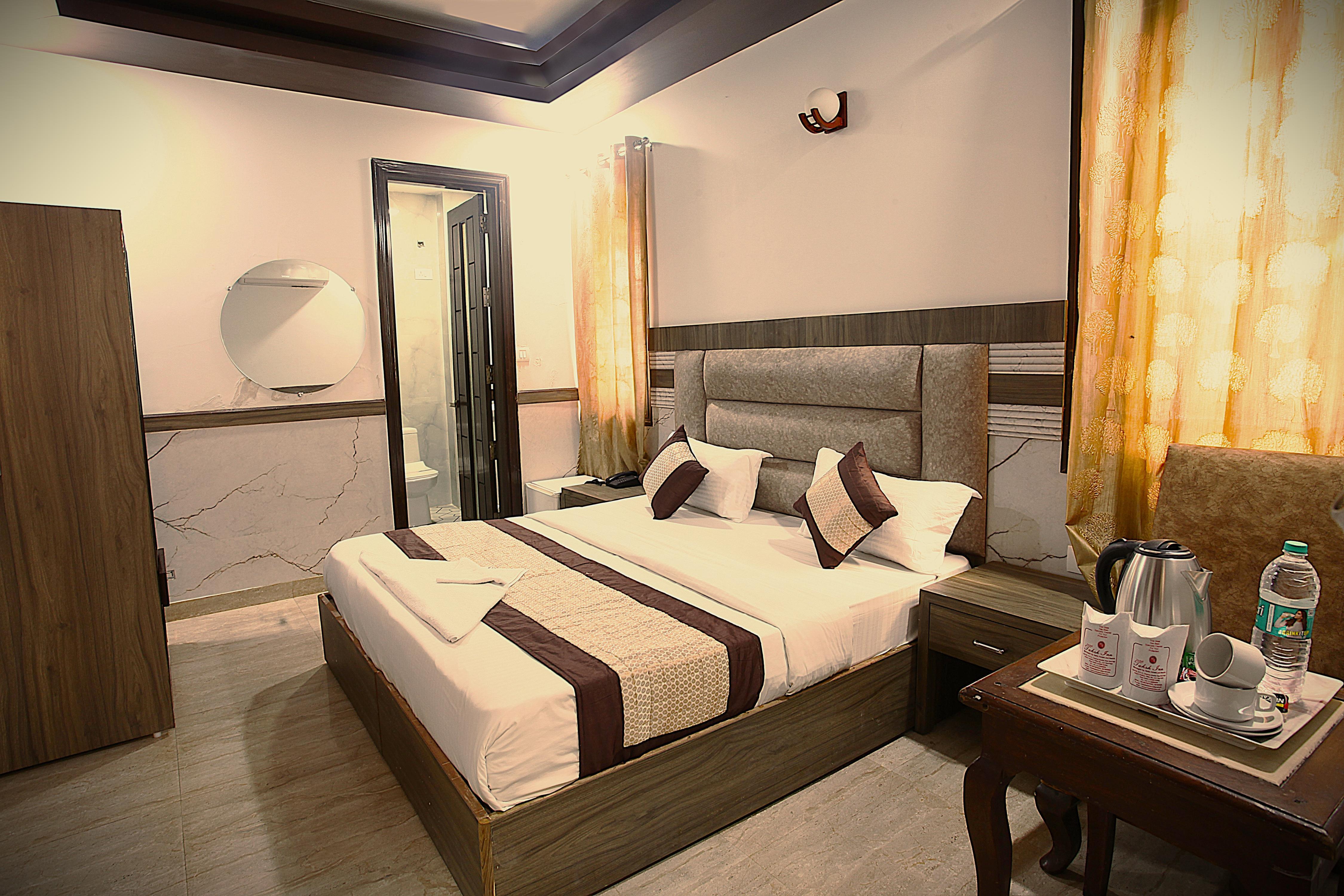 Taksh Inn Room Type - Super DX AC Room - Free Wi fi