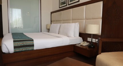 Manish Aura Grand Room Type - Deluxe Room