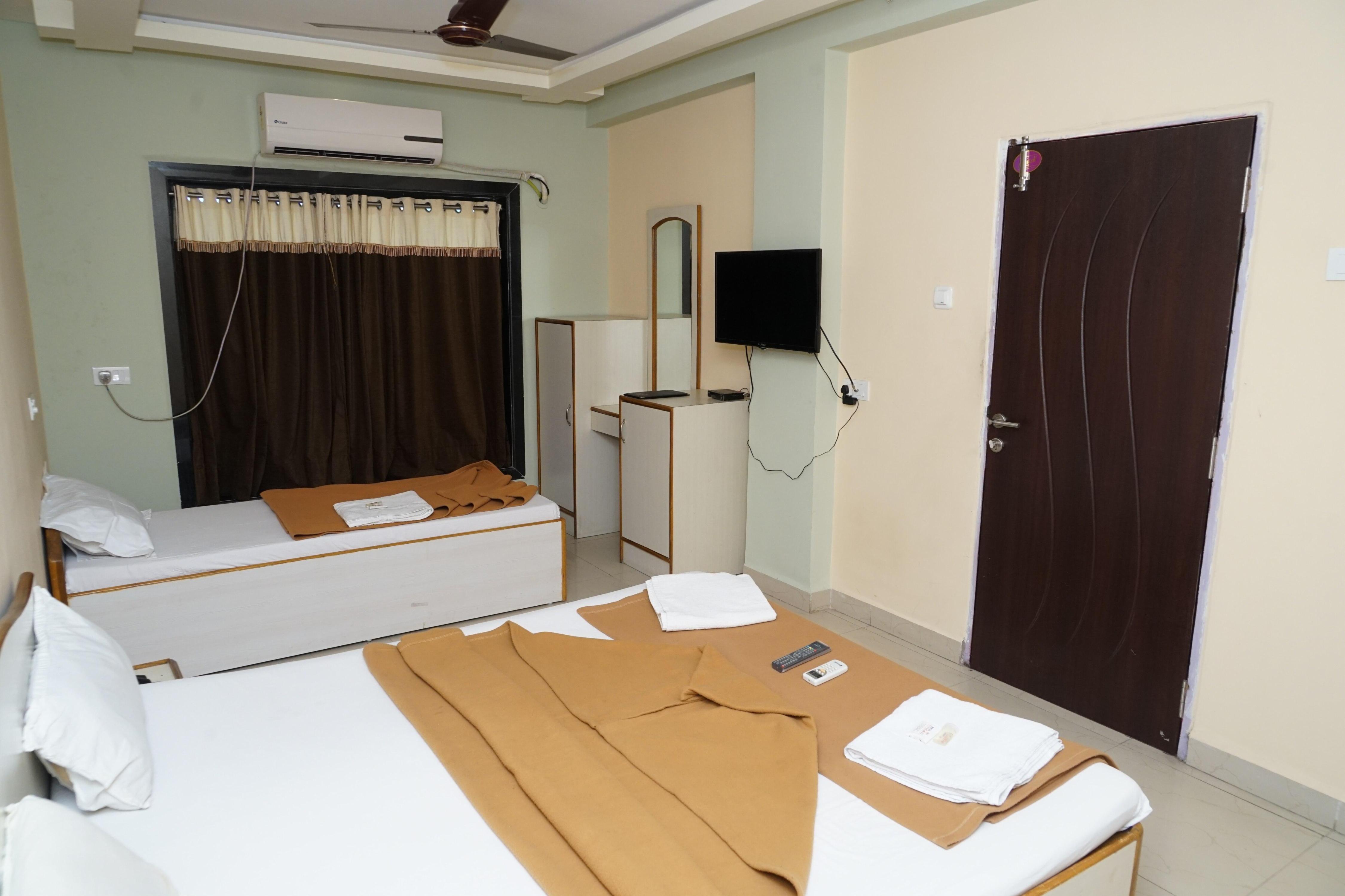 HOTEL UMESH Room Type - Triple Bed Room