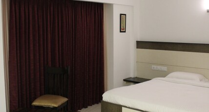 Hotel Karpagam International Room Type - Deluxe Room