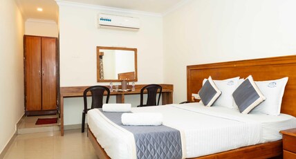 Hotel NNP Grand Room Type - Deluxe Double Bed AC