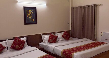 Breeze Hotel New Jalipaiguri Room Type - Deluxe quadaraple  AC room