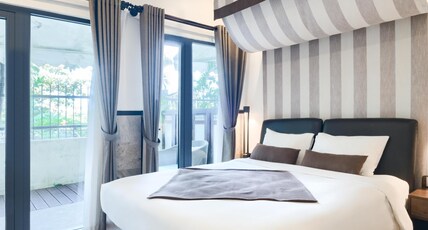 THE BLOSSOM RESORT ISLAND DA NANG Room Type - Superior King Room with Partial River View - Onsen Included THE BLOSSOM RESORT ISLAND DA NANG Room Type - Superior King Room with Partial River View - Onsen Included