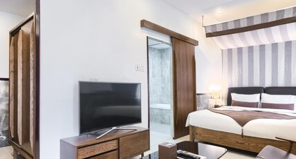 THE BLOSSOM RESORT ISLAND DA NANG Room Type - Premier King Room with Partial River View - Onsen Included THE BLOSSOM RESORT ISLAND DA NANG Room Type - Premier King Room with Partial River View - Onsen Included