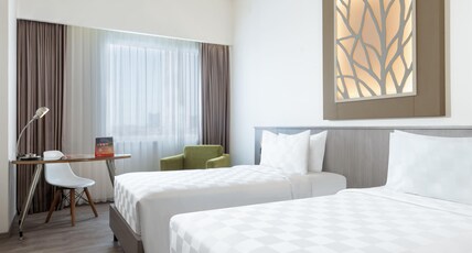 Swiss-Belinn Manyar Room Type - Deluxe Twin Room