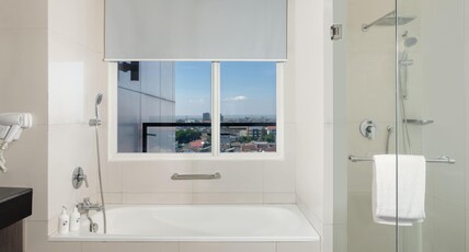 Swiss-Belinn Manyar Room Type - Junior Suite Room Swiss-Belinn Manyar Room Type - Junior Suite Room