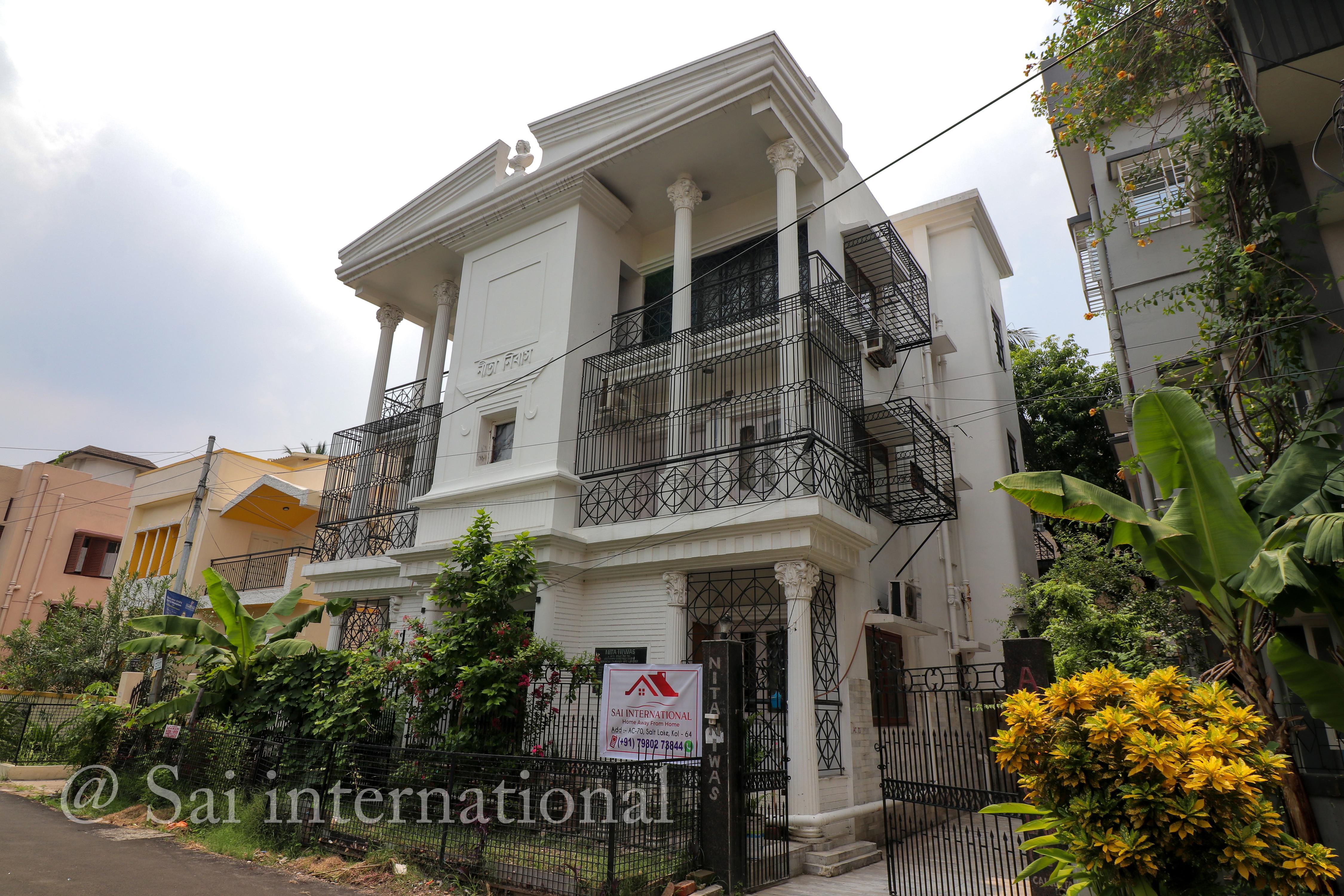 Sai International Guest House - Tap to explore photos