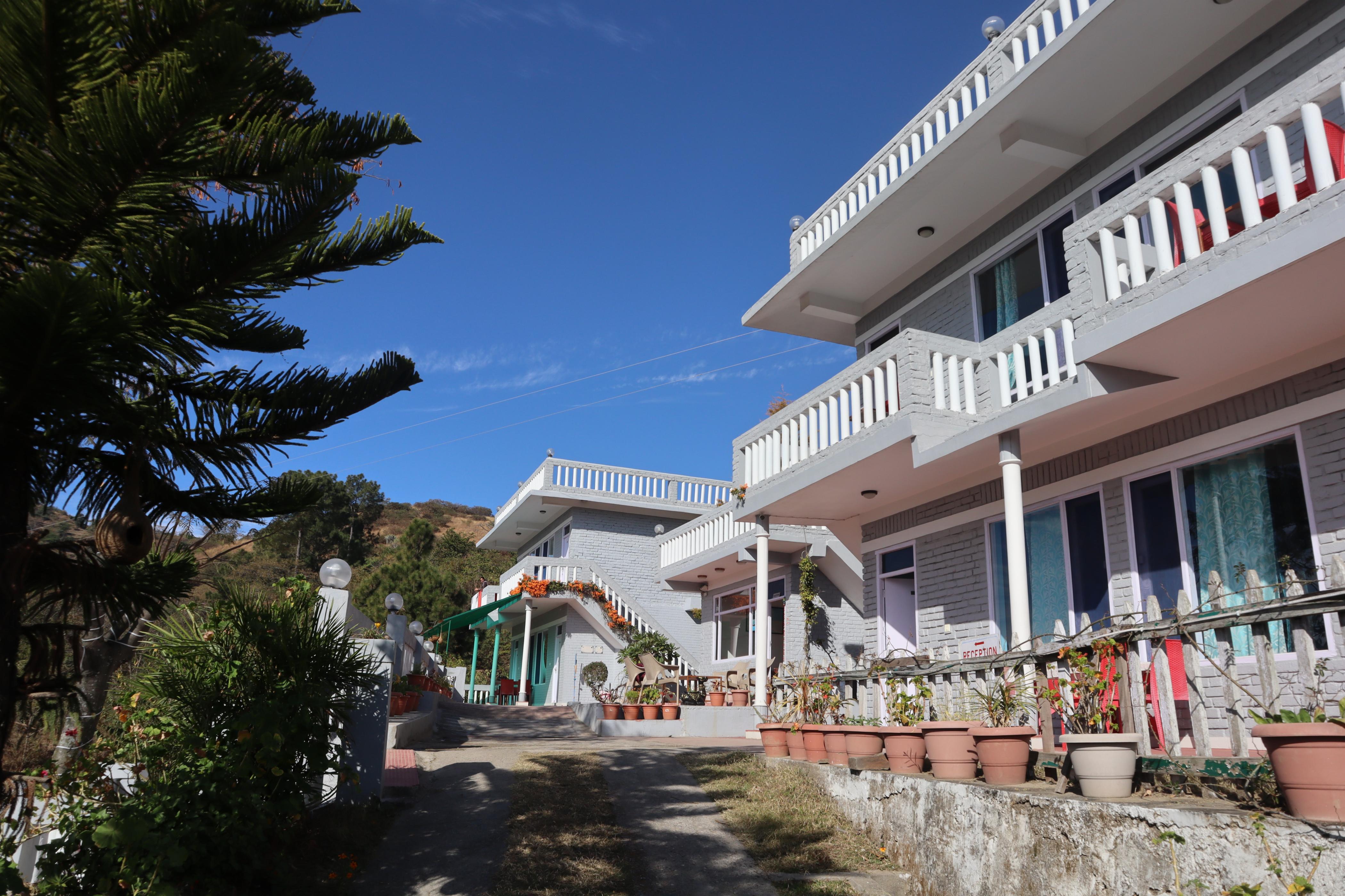 Pristine Courtyard Resort Shoghi Shimla - Tap to explore photos