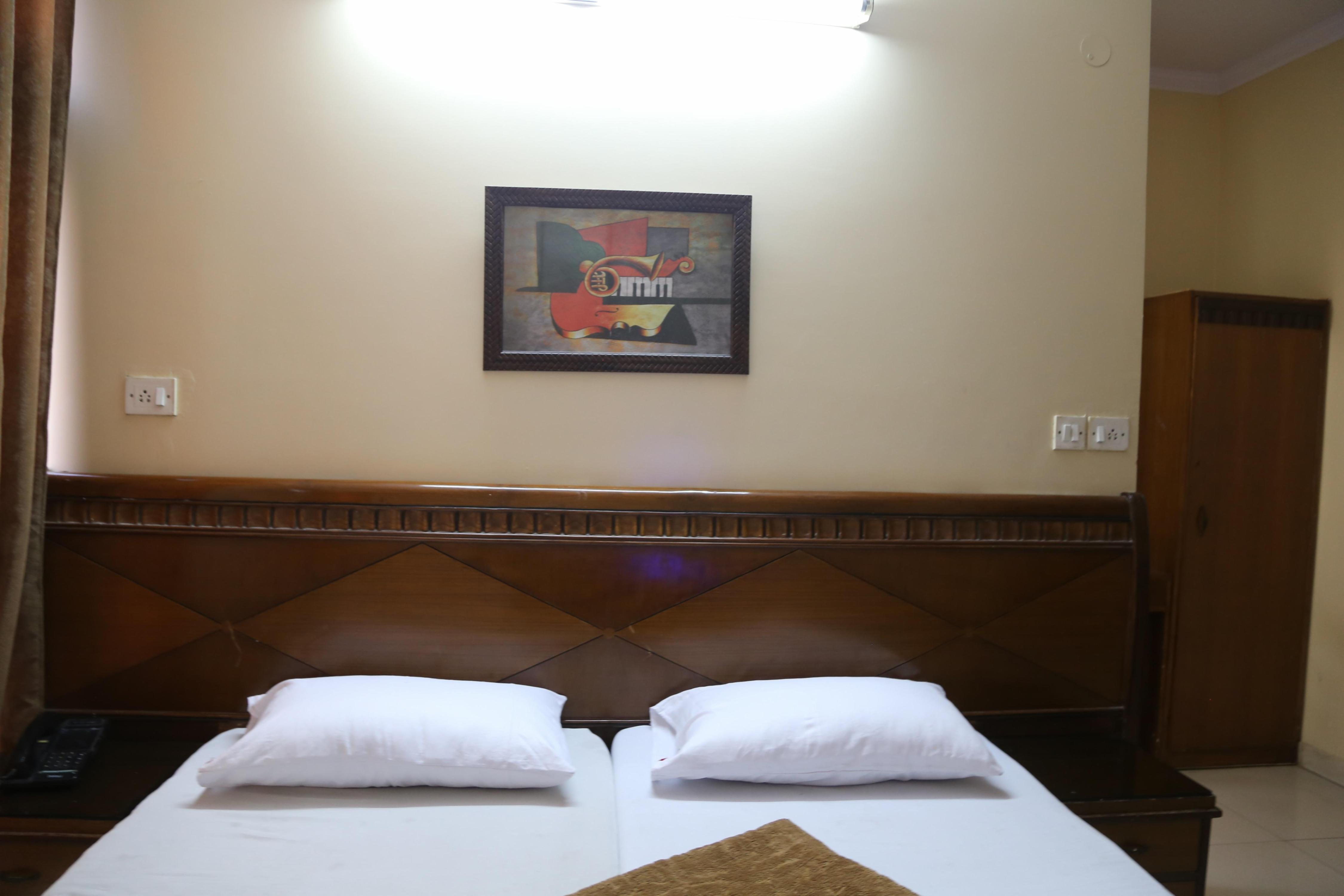 Arya Tourist Lodge - Tap to explore photos