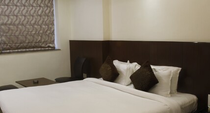 Hotel Mercury Residency Room Type - Deluxe Room with Work Desk
