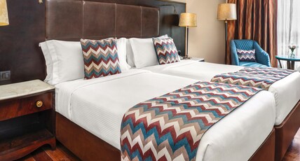 Eros Hotel New Delhi by IHG Room Type - 2 Twin Classic Pool View Lounge Access Eros Hotel New Delhi by IHG Room Type - 2 Twin Classic Pool View Lounge Access