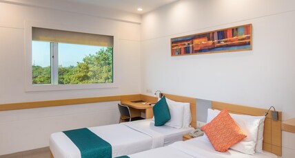 Mango Grove Hotel Room Type - Superior Room - Grove View- Twin Beds Mango Grove Hotel Room Type - Superior Room - Grove View- Twin Beds