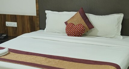 Atharva Hotel by M Square. Room Type - EXECUTIVE TWIN BED ROOM