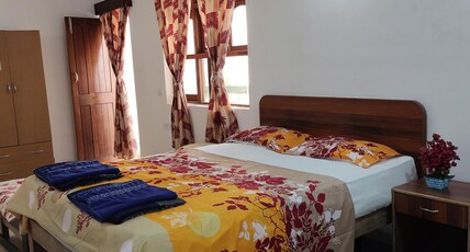 Hotel Kismat Mahal. Room Type - Deluxe AC Quad