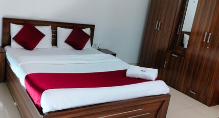 NP Hospitality Amanora Room Type - Standard AC with External private bathroom-102