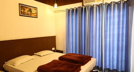 Hotel Moksha (500m From Ram Jhula) Room Type - Zen Room with Balcony