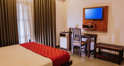 Nirmallyam Residency Room Type - Deluxe AC Room